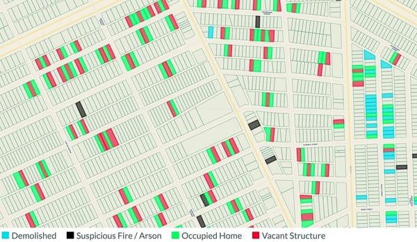 Occupied homes adjacent to vacant publicly owned structures.